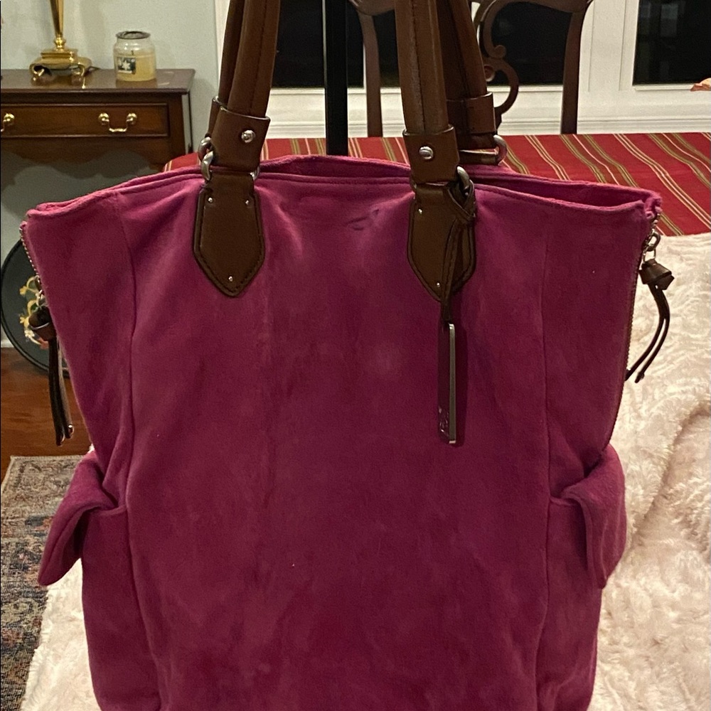 Botkier pink suede hobo purse.
